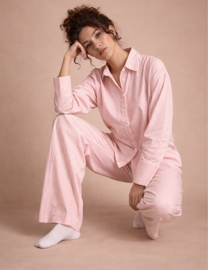 Rosie Set sewing pattern modeled in pink striped fabric with button-up shirt and wide-leg pants