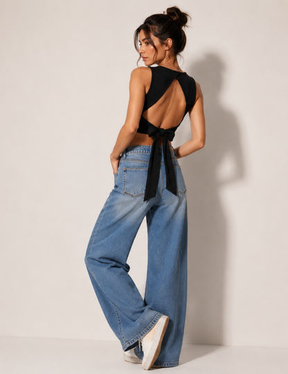 Calypso Top sewing pattern close-up showing the crossover open back, long waist ties and bow detail