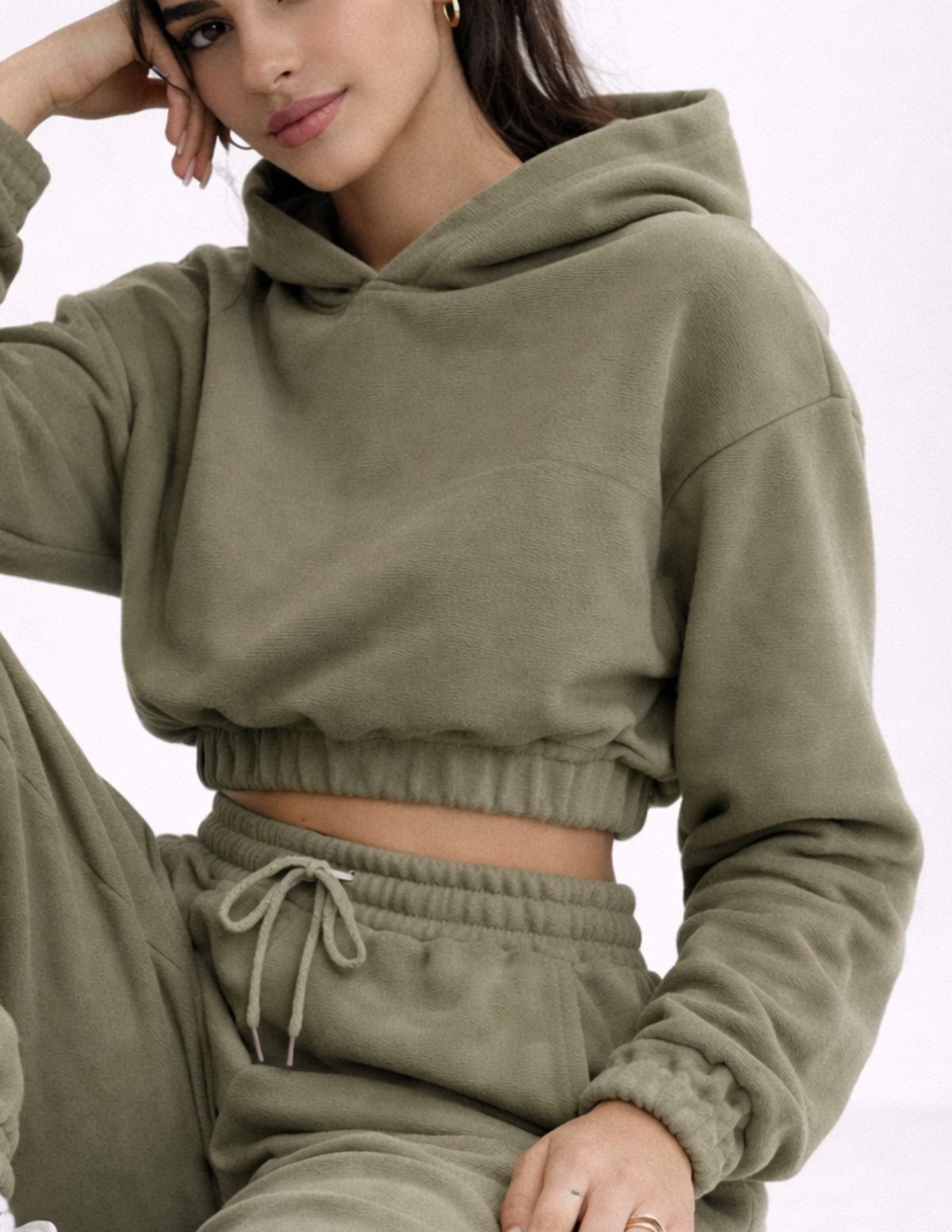 Woman wearing the EBONY cropped hoodie with hood and relaxed sleeves, digital PDF sewing pattern for women.