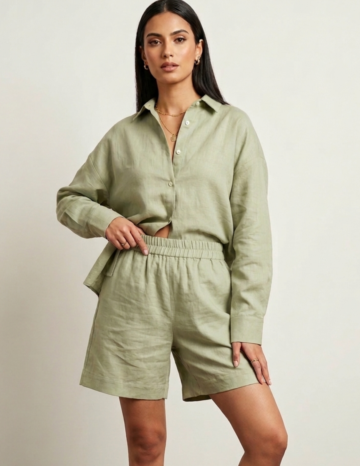 Woman wearing a MIA Blouse made from a PDF sewing pattern with long sleeves and button front