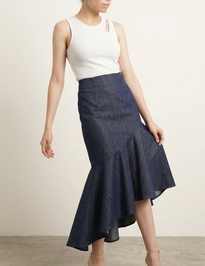 Monica Skirt Sewing Pattern PDF shown in a side view with asymmetrical hem and diagonal ruffle detail