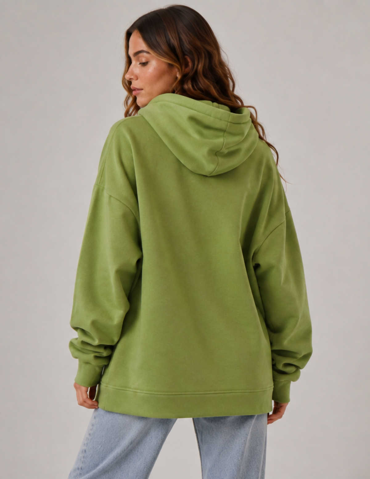 Back view of the OLEA women's oversized hoodie  with a large hood, relaxed fit, dropped shoulders and long sleeves
