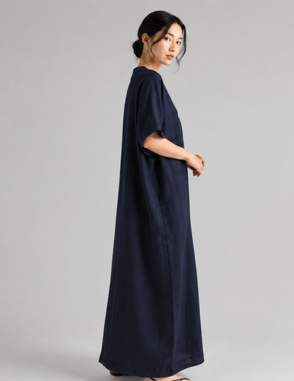 Women's V-neck dress sewing pattern 
PDF shown in a loose fit with short 
sleeves and long flowing silhouette